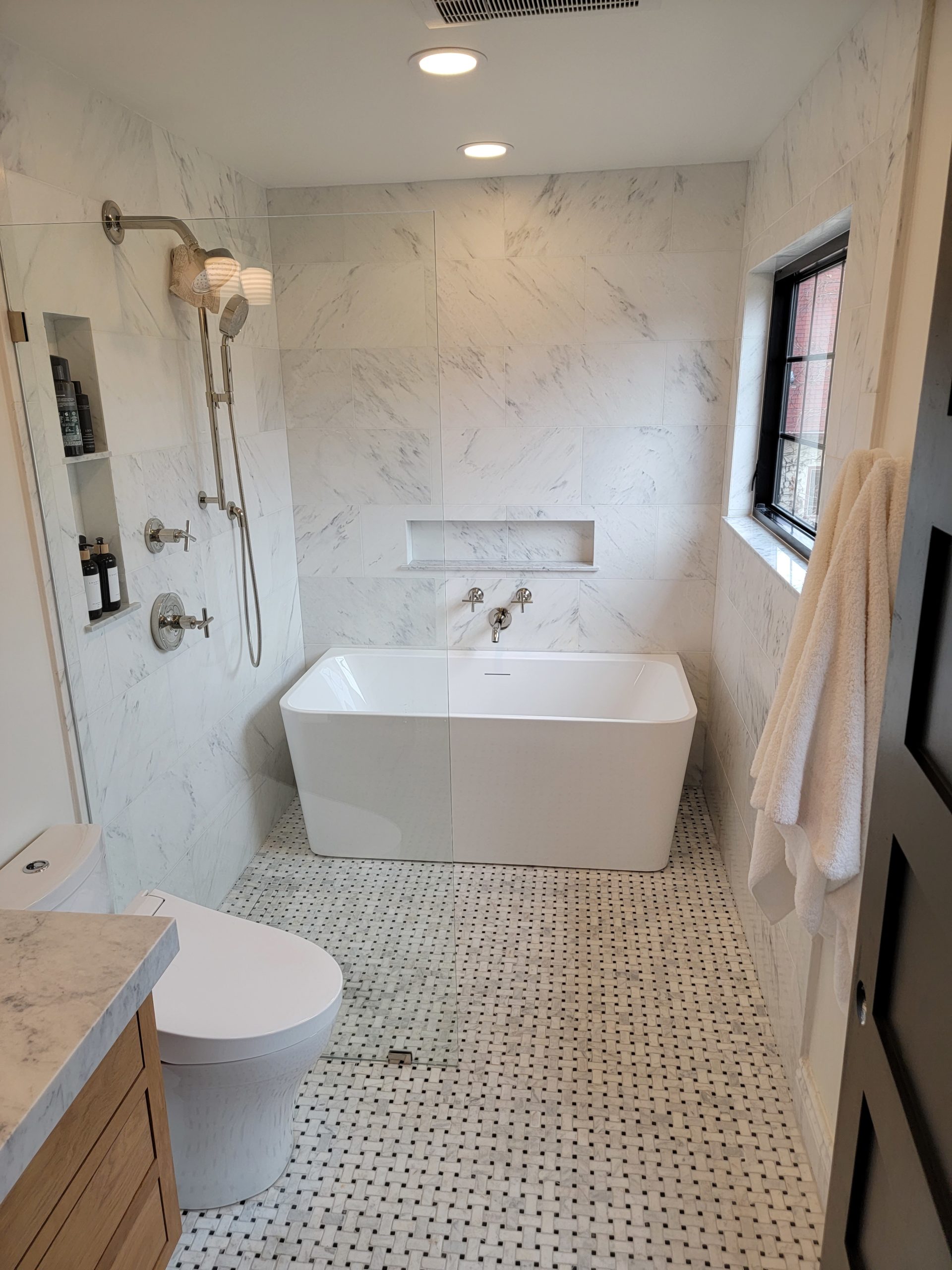 Walk in shower with free standing tub