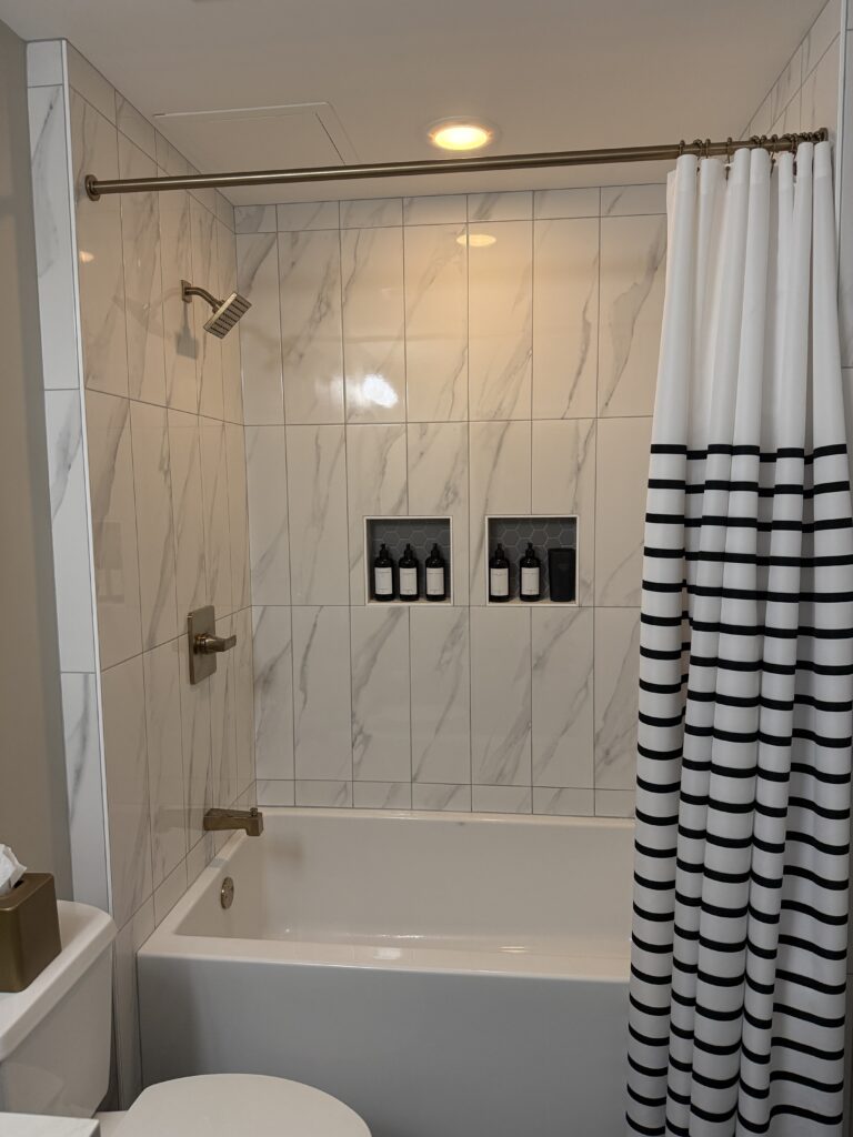 Minneapolis condo tub shower after remodel picture