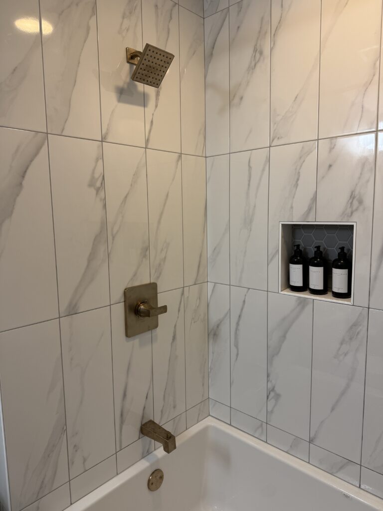 Minneapolis condo tub shower after remodel picture